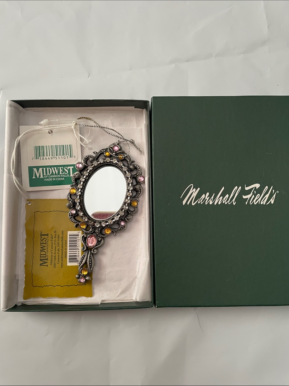 Marshall Field's Decorative Hand Mirror with Pink and Yellow Accents